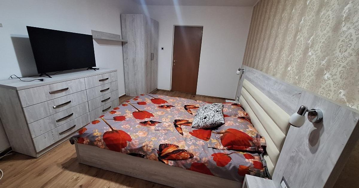 Închiriez apartament spatios cu 2 camere,parter,zona Calea Moldovei,parcare incl