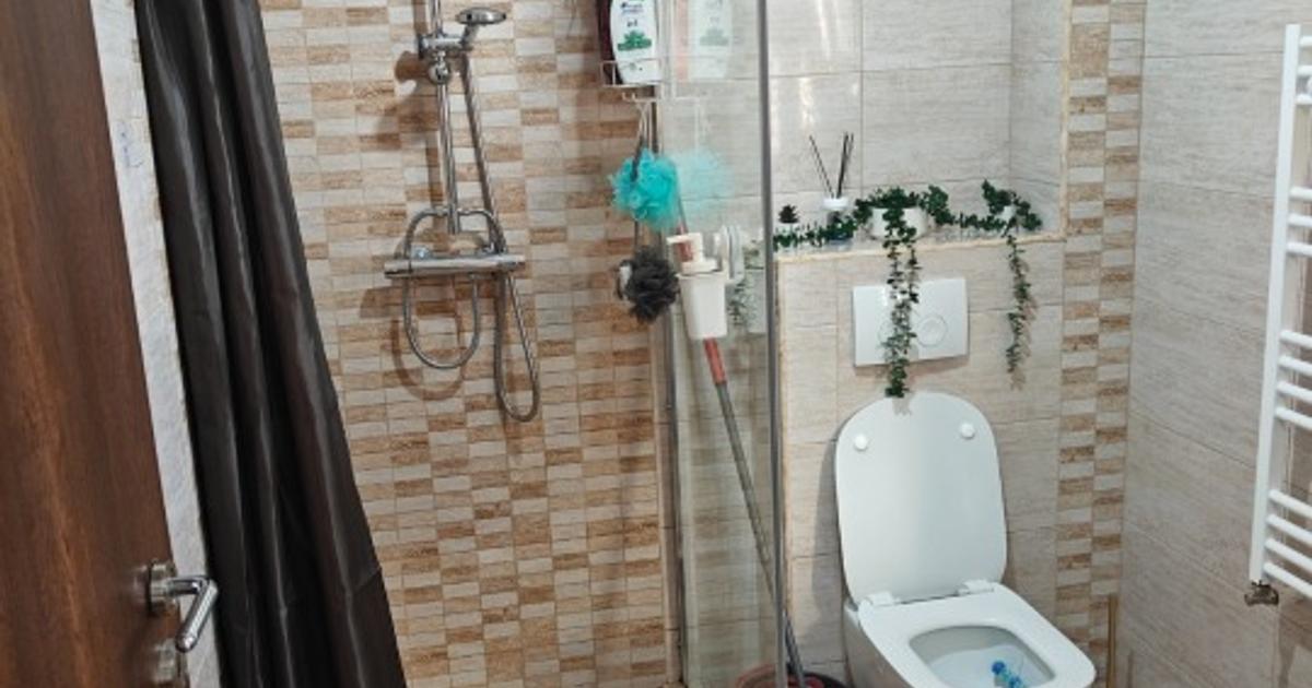 Casă P+M cu placă de beton, teren 450 mp, curte amenajată – Giurgiu, Str. Negru